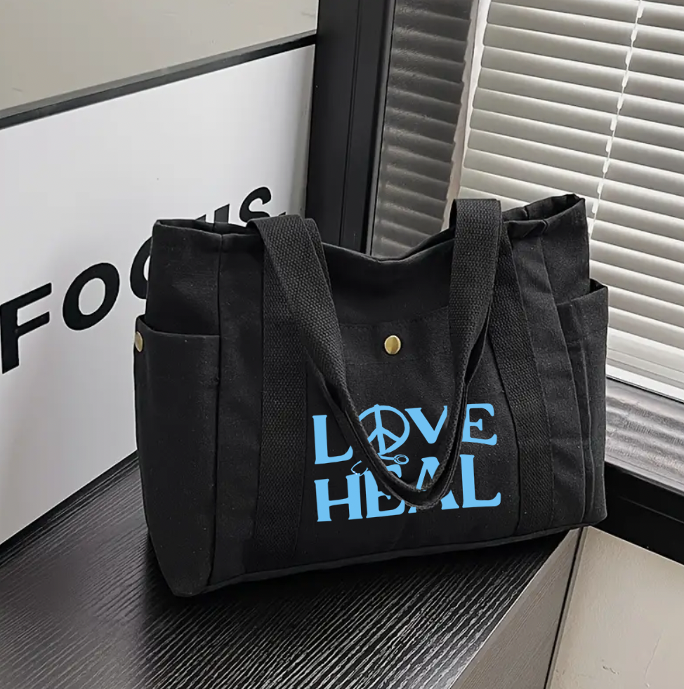 Love Heal Black Tote bag